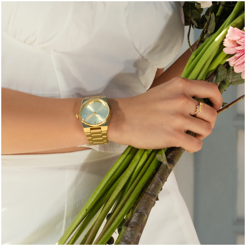 Radiant Air Reloj de Mujer Dorado con Brazalete de Acero