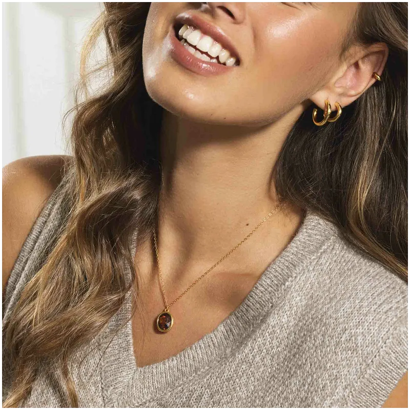 Pendientes de aro pequeños Radiant en oro dorado